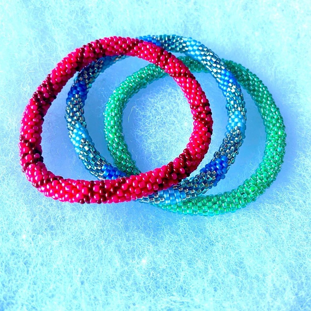 NWOT Tags. Glass bead bracelets.